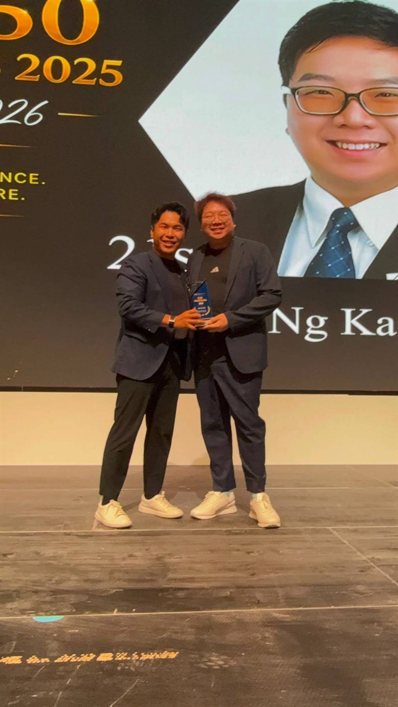 Ka Wai on stage receiving a JNA Real Estate Top 50 award in 2025